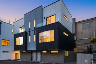 Gorgeous grey-brick siding, an abundance of windows and view-ridden roof decks come together to form this stunning pre-sale opportunity, by Greencity Homes.