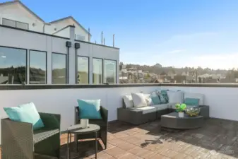 Plenty of space for barbecue, summer gatherings or just hanging out and reading on the roof deck