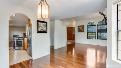 View from the dining area, peering into the kitchen and family room.