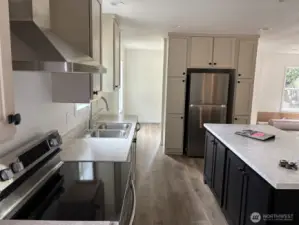 Kitchen with stainless appliances.