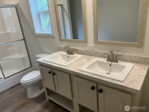Main Bathroom with double sinks.