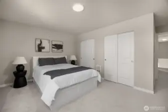 Spacious primary bedroom has 2 closets