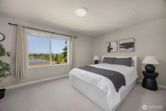 Primary bedroom overlooks Martha Lake and Cascade mountains