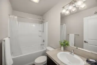 Second bathroom includes tub and shower