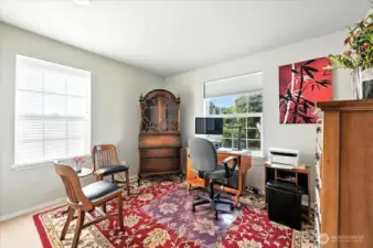 One of the Bedrooms used as an office, has a nice look at the backyard.