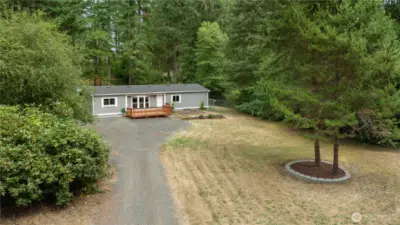 Spacious and wooded lot with room to park and fully fenced back yard!