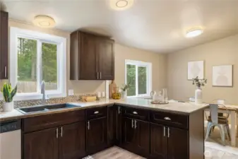 Large kitchen opens to the dining and living spaces
