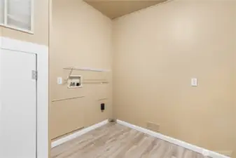 Utility/Laundry room with access to backyard