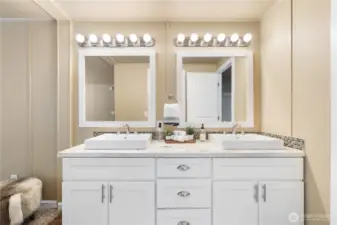 Double vanity, large closet space, and seperate shower room.