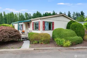 Beautifully landscaped front yard that’s easy to maintain, offering charm without the upkeep.