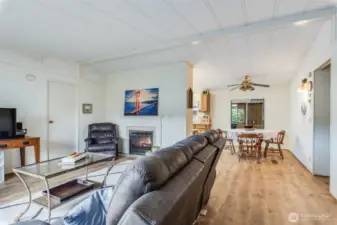 Spacious, open living room with a propane fireplace for warmth and comfort all year.