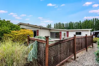 Privacy fence creates a sense of security and comfort around the home.
