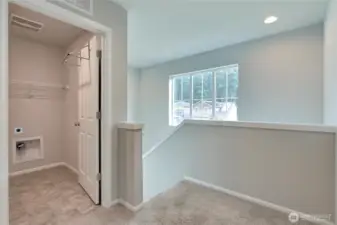 Upstairs landing view, I love the large windows and also that the utility room is up!