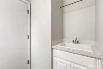 Laundry room on main level with sink