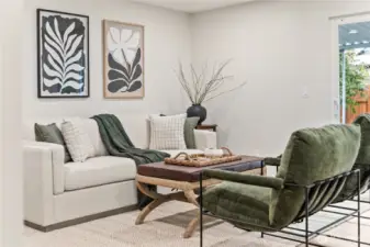 Spacious Living Room off of Kitchen w/ access to back covered patio!