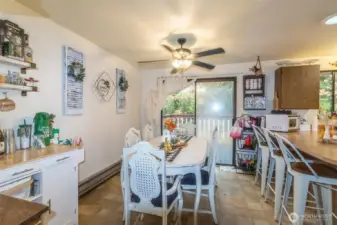 Dining room with slider door leading to deck