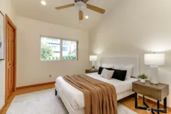 2nd bedroom with blinds and ceiling fan