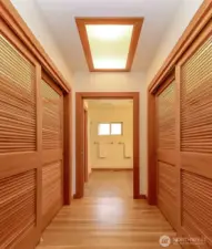 Large walkin closets with lighting and skylight