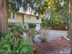 This home is ready to enjoy and in a great location on a large lot. Everything you've been looking for! The front yard features a beautiful natural, wooded setting.