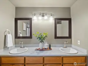 The big double sink vanity in the main bath gives everyone their own space.