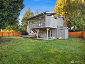The big backyard can be accessed through vehicle gates, is fully fenced, includes a gardening shed, and gives you space for whatever you'd like to do.