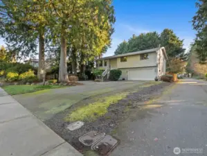 There is extra parking space next to the driveway for guest or toys.