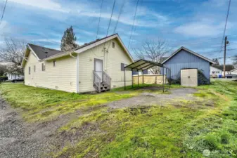 Back Yard View showing Carport, Shed and Additional Parking