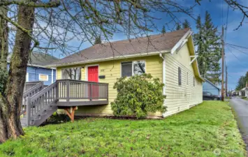 Alley Side of the Home Leads to Carport Parking