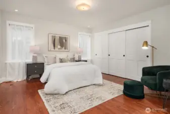 Primary Bedroom on this level is a spacious retreat with all the amenities needed for a relaxing and rejuvenating atmosphere.  Make life simple with lighted closet organizers. In-spa bath with glass enclosed steam shower, free standing bathtub, heated floors and towel rack, dual sinks and plenty of cabinet space. High quality Kohler fixtures, mosaic marble, pewter sconces, hand rubbed antique brass, dual Robern medicine cabinets.