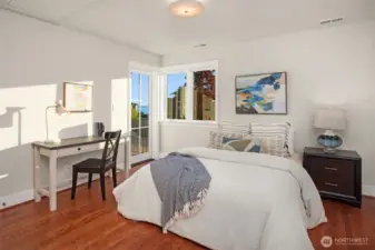 Upper level has second primary ensuite with view of Seattle skyline,  Mt Rainier and Puget sound.