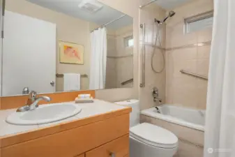 Attached primary bathroom with jacuzzi tub.