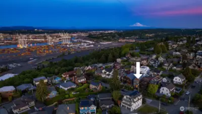 Mt. Rainier is in the distance and can be seen from the top floor of the home.