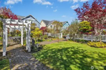 This phase of Poulsbo Place features an enchanting community rose garden—a cherished space for residents and guests to enjoy year-round.