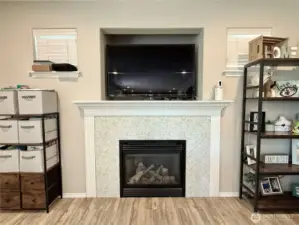 gas fireplace with tv space above