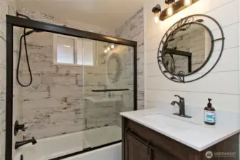 Fully remodeled downstairs bathroom.