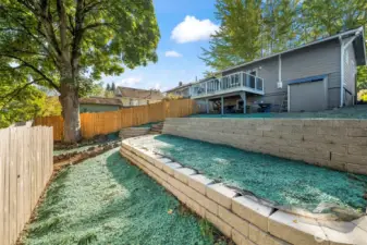 The property goes well beyond the fence to the alley!