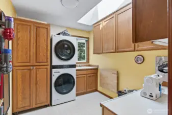 Laundry is on the main level with a built in sewing desk.