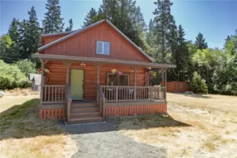 Super cute log home all pretty with fresh paint!
