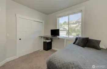 The second bedroom is located to the right.