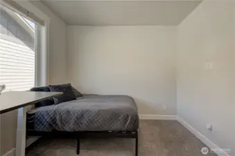 Additional angle showcasing the second bedroom.