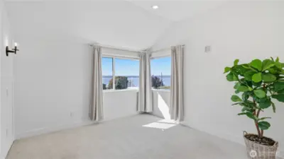 Bedroom windows bring in abundant natural light and mesmerizing views.