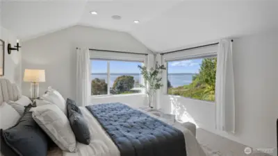 Windows frame sweeping Puget Sound vistas.