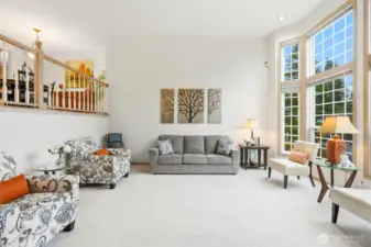 Formal living rm w/ floor-to-ceiling windows