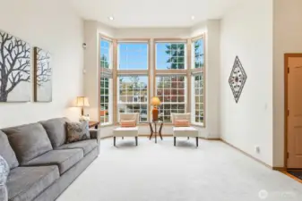 Formal living rm w/ floor-to-ceiling windows