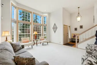 Formal living rm w/ floor-to-ceiling windows