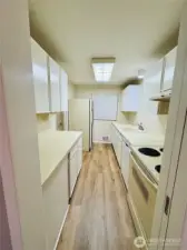Idea- possibly remodel kitchen and inquire about removing a wall and put in a kitchen islane.