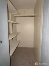 BUILT IN SHELFS IN EXTRA STORAGE OFF SLIDER IN LIVING ROOM