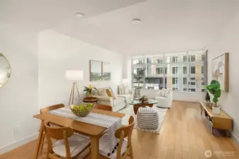 Open floor plan, floor-to-ceiling windows, hardwood floors!