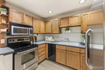 This kitchen is a joy to cook in! Stainless appliances and ample storage space will please any home chef.