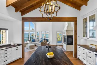 From the kitchen, the space flows into the family room where wide windows frame incredible water and island views.  Orcas, seals and sea otters can often be seen playing in the water.